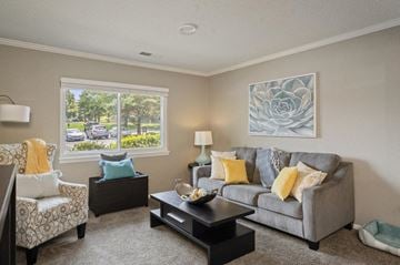 Overland Park apartment for rent - a living room with a couch and a table