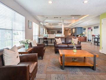 Florissant apartment for rent - a living room with couches and a coffee table