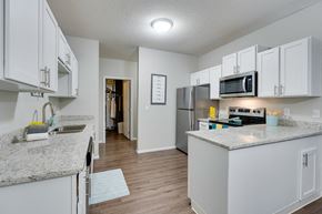 Bloomington apartment for rent - Kitchen With White Cabinetry & Stainless Steel Appliances