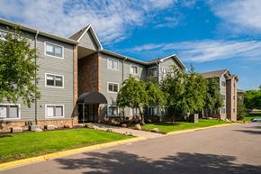 Bloomington apartment for rent - France 98 Apartment Homes Exterior With Brick & Green Siding