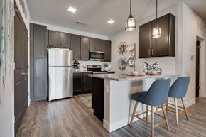 Wentzville apartment for rent - Kitchen With Granite Countertops & White Subway Tile Backsplash