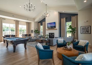 Huber Heights apartment for rent - A living room with a pool table and a television.