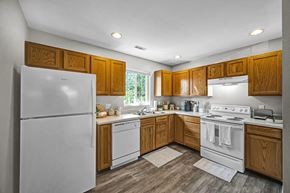 Dunlap apartment for rent - Fully Equipped Kitchen with White Appliances