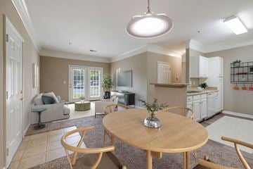 Columbia apartment for rent - A well-lit, spacious kitchen and living room with a dining table and chairs.