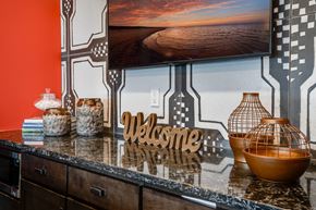 Rogers apartment for rent - Clubhouse Kitchen Countertop and Mounted TV