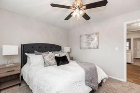 Shawnee apartment for rent - Bedroom with Plush Carpet and Ceiling Fan and Light