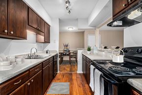Hoover apartment for rent - Kitchen with Dark Brown Cabinetry and Stainless Steel Appliances