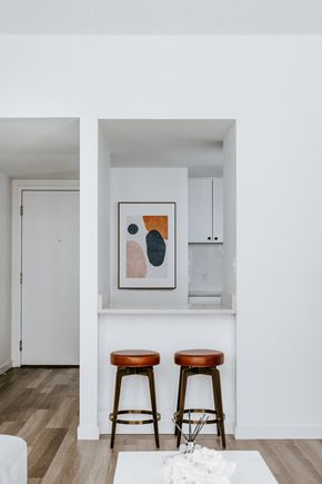 Cleveland apartment for rent - a small kitchenette with two stools in a 555 waverly unit