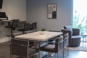 Redlands apartment for rent - a room with a table and chairs at The Crossings at Redlands, Redlands