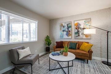 Phoenix apartment for rent - a living room with a couch and a coffee table