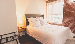 Philadelphia apartment for rent - a bedroom with a bed and a window