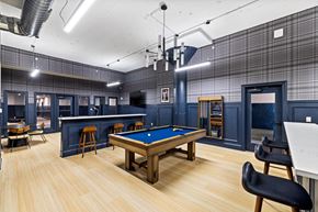Philadelphia apartment for rent - a game room with a pool table and a bar