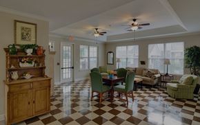 Greenville apartment for rent - A checkered floor in a room with a table and chairs.