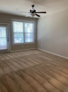 Goose Creek apartment for rent - Living Rooms with Ceiling Fan at Etiwan Place, Goose Creek, SC 29445