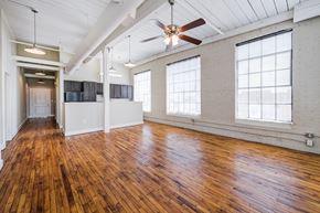 Asheboro apartment for rent - Living room with wooden floors at Asheboro Mill Lofts, Asheboro
