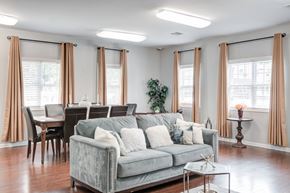 Concord apartment for rent - Spacious Living room with dining room view at Brooke Pointe Apartments, Concord, North Carolina