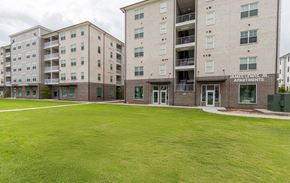 Charleston apartment for rent - Property Exterior with Lush Green Space at James Lewis Jr, Charleston, SC 29403