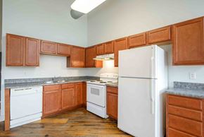 Lynchburg apartment for rent - Kitchen with white appliances at Kemper Lofts Apartments, Lynchburg, 24501