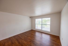 Marion apartment for rent - Empty room with wooden floors and a window.