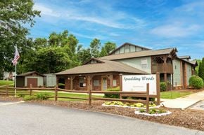Marion apartment for rent - Spaulding Woods Apartments is a residential complex with multiple buildings and a welcoming entrance.