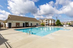 Stonecrest apartment for rent - A large swimming pool in front of a building. at Stone Terrace Apartments, Georgia