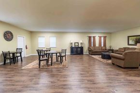 Chesapeake apartment for rent - A living room with a wooden floor and furniture. at The Shire Apartments, Chesapeake, VA, 23325