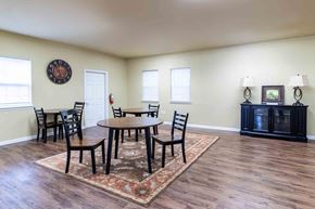 Chesapeake apartment for rent - A dining room with a round table and chairs. at The Shire Apartments, Virginia