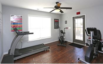 Gm with a treadmill, elliptical trainer, and a stationary bike.