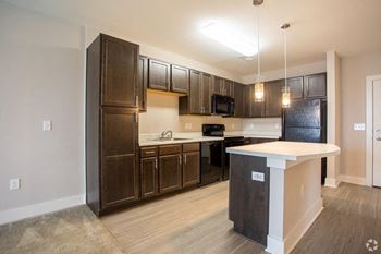 Kitchen with wooden cabinets