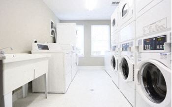 Row of washers and dryers