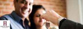 Greenville apartment for rent - A Person is Handing Over a Key to Another Person at Berea Heights Villas Apartments, Greenville, 29617