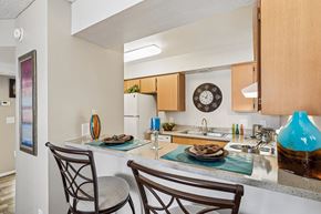 Glendale apartment for rent - A kitchen with a table and two chairs.