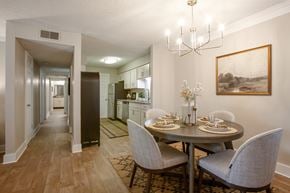 Hendersonville apartment for rent - A dining room with a table set for two.