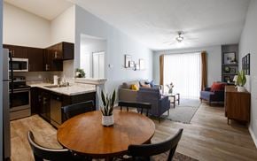 Goodlettsville apartment for rent - A modern kitchen with a dining table and chairs.