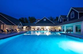 Goodlettsville apartment for rent - A large swimming pool lit up with blue lights at night.