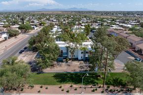 Tucson apartment for rent - A residential area with houses and trees.