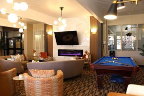 Albuquerque apartment for rent - Clubhouse Seating and Billiards at Los Altos Towers Apartments in Albuquerque NM