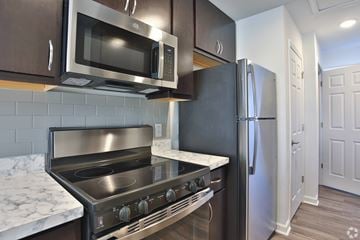 Columbia apartment for rent - A kitchen with a stainless steel oven and microwave.