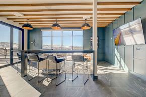 Lone Tree apartment for rent - A modern dining area with a table and chairs.