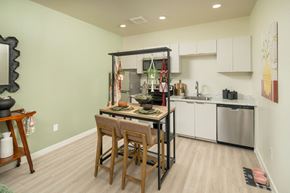 Phoenix apartment for rent - Dining Area and kitchen of One bedroom at Streamliner 16th Apartments in Phoenix Arizona