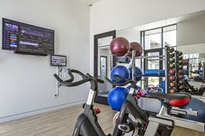 Phoenix apartment for rent - Fitness center at Senderos at South Mountain in Phoenix AZ September 2020