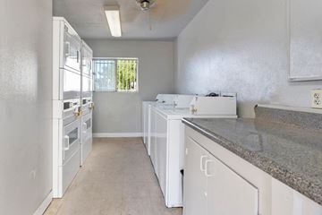 Tempe apartment for rent - the kitchen has granite counter tops and white appliances