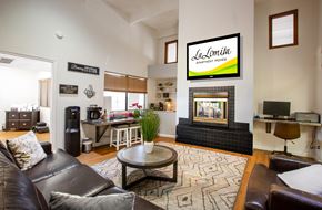 Tucson apartment for rent - A living room with a fireplace and a sign that says