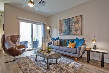 Phoenix apartment for rent - a living room with a couch and a chair and a table