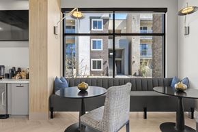 Avondale apartment for rent - A modern dining room with a table and chairs.