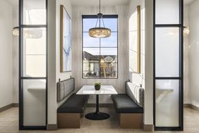 Queen Creek apartment for rent - A modern dining room with a table and chairs.