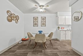 Tucson apartment for rent - A dining room with a table and chairs.