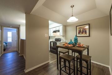 Baytown apartment for rent - A dining room with a table and chairs.