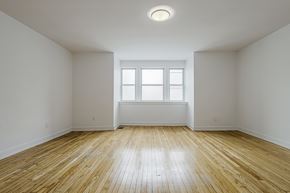 Toronto apartment for rent - an empty room with wood floors and a window at 723 Bloor Apartments, Toronto, M6G 1L5
