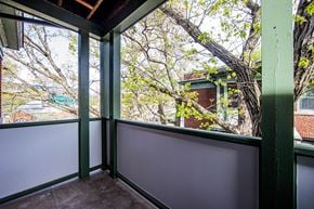 Toronto apartment for rent - a screened in porch with a tree out the window at 83-85 Silver Birch, Toronto, CA